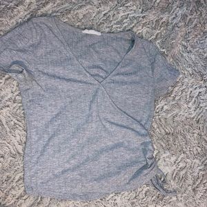 Size S brand is Pink Rose 60%polyester 35%rayon 5%spandex